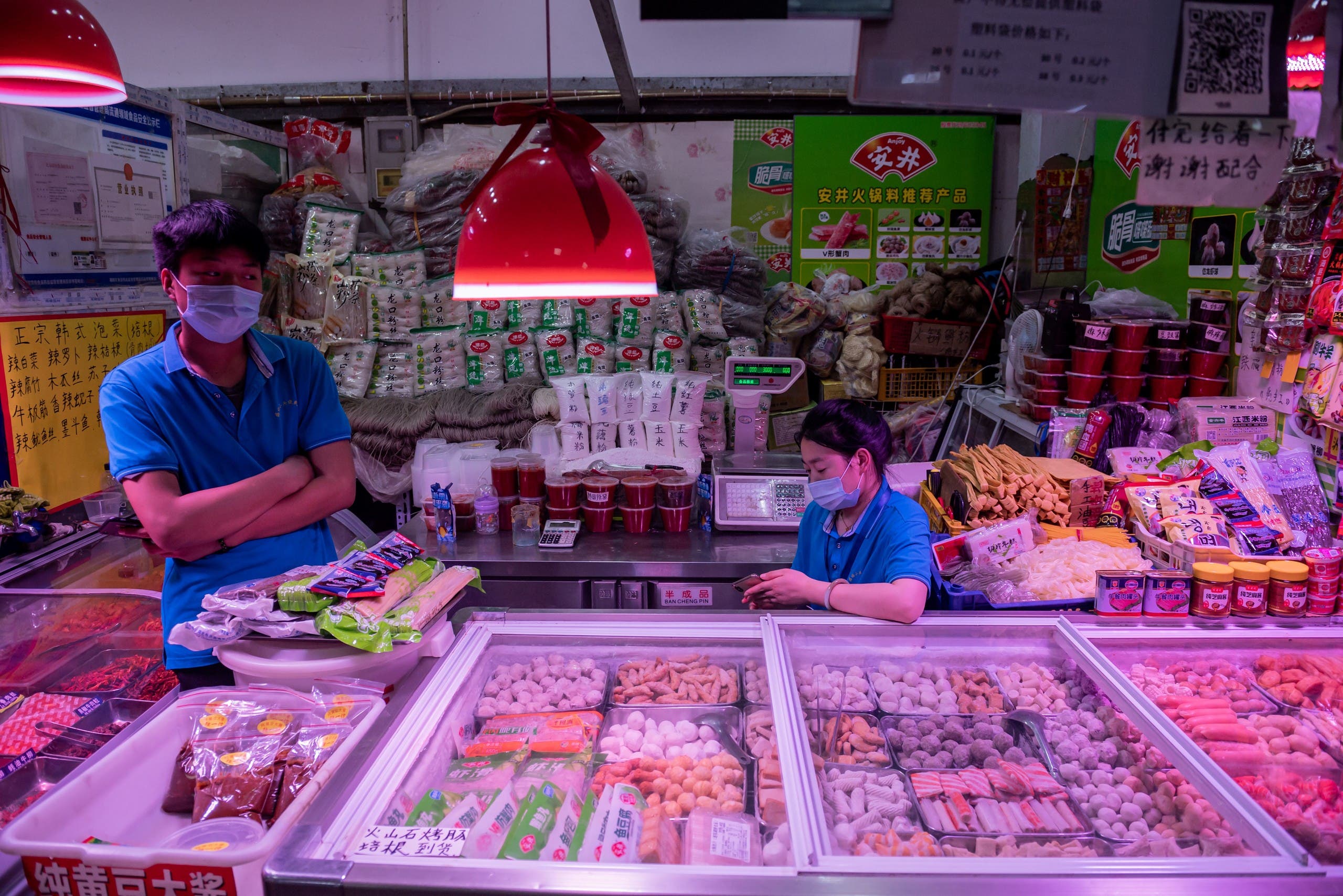 از بازار فروش غذاهای دریایی و گوشت در چین (بایگانی - فرانس پرس)