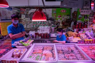 من سوق لبيع المأكولات البحرية واللحوم في بكين (أرشيفية- فرانس برس)