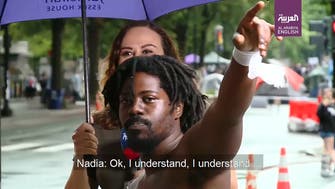 Watch: Al Arabiya's Washington correspondent harassed by Black Lives Matter protester