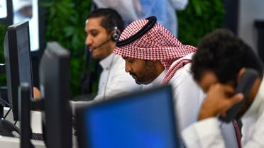 Employees work at the Saudi National Health Emergency Operations Center in the capital Riyadh on May 3, 2020. (AFP)