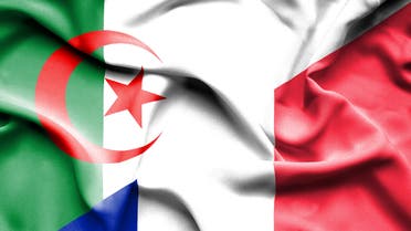Waving flag of France and Algeria stock photo