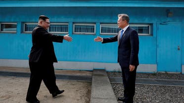 South Korean President Moon Jae-in and North Korean leader Kim Jong Un shake hands at the truce village of Panmunjom inside the demilitarized zone separating the two Koreas, South Korea, April 27, 2018. (Reuters)