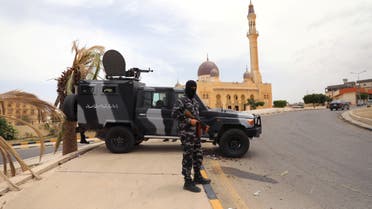 A member of security forces loyal to Libya's GNA holds a weapon during a security deployment in Tarhouna, Libya on June 11, 2020. (Reuters)