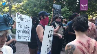 Watch: White protesters in Charleston slammed for showing up in chains, whipped backs