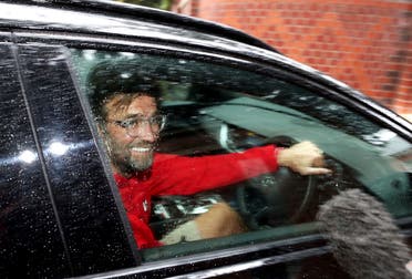 Liverpool manager Jurgen Klopp arrives at his home in Formby, Liverpool, England, on June 26, 2020. Liverpool clinched its first league title since 1990 on Thursday, ending an agonizing title drought. (AP)