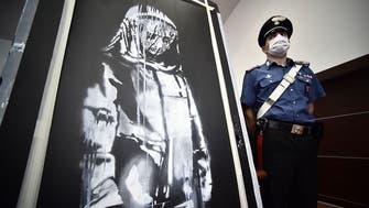France arrests six over stolen Banksy artwork