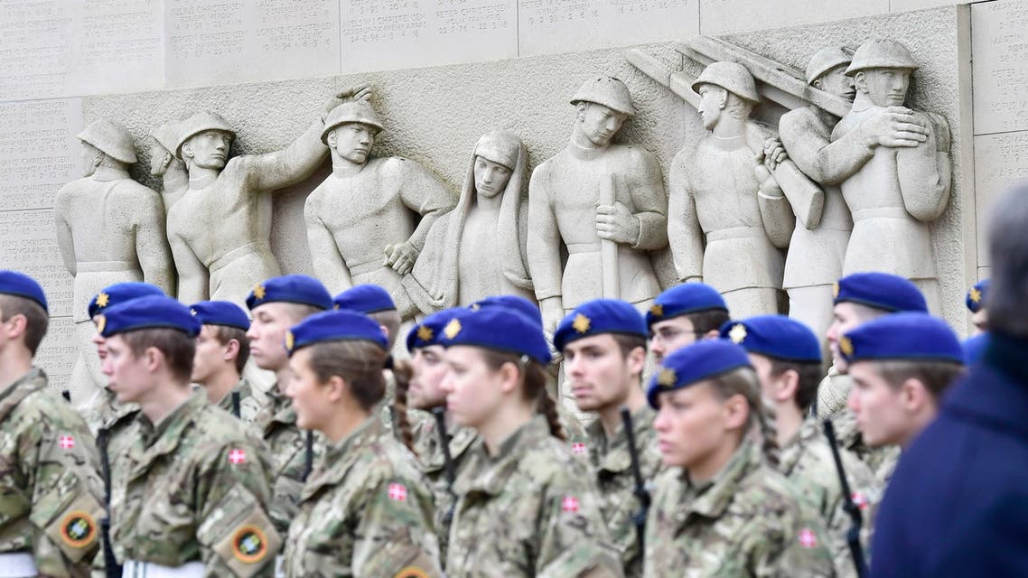 Soldiers are pictured during a wreath laying ceremony to mark the 100th anniversary of the end of World War I in Mindeparken in Aarhus, on November 11, 2018.