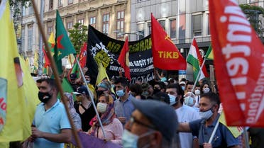 Kurdish demonstrators during a protest against Turks in Vienna, Austria, Saturday, June 27, 2020. (AP)