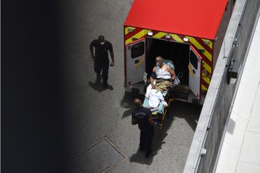 A man arrives at Houston Methodist Hospital emergency room on a stretcher amid a coronavirus disease (COVID-19) outbreak in Houston, Texas, US, June 28, 2020. (Reuters)