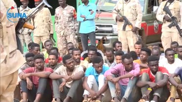 A screengrab of a video published by Sudan News Agency on June 29, 2020 showing some of the 122 fighters who were allegedly intending to serve as mercenaries in Libya’s civil war . (Twitter/via @SUNA_AGENCY)