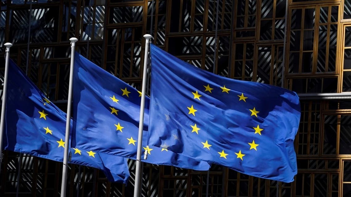 A picture taken on May 28 in Brussels shows the European Union flags fluttering in the aire outside the European Commission building in Brussels. (AFP)