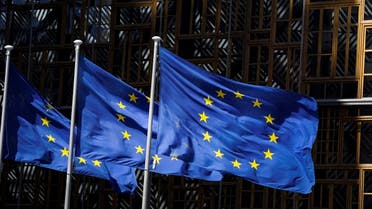 A picture taken on May 28 in Brussels shows the European Union flags fluttering in the air outside the European Commission building in Brussels. (AFP)