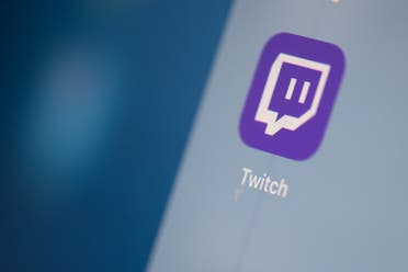 This file photo taken on July 24, 2019 shows the US live streaming video platform Twitch logo application on the screen of a tablet. (AFP)