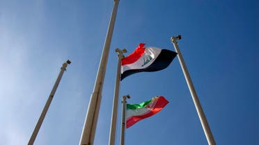 Iraq (top) and Iran flags flutter in the wind during a farewell ceremony for Iraq's Prime Minister Nuri al-Maliki at the International Mehrabad airport in Tehran January 4, 2009. (Reuters)
