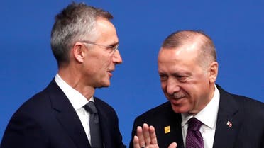 A file photo of NATO chief Jens Stoltenberg (L) and Turkey's President Erdogan (R) during the NATO summit in London, December 4, 2019. (AFP)