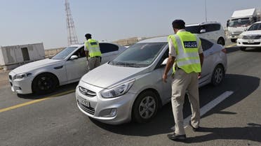 Emirati security forces man a checkpoint at the entrance of Abu Dhabi, on June 2, 2020, after authorities cordoned off the emirate to rein in the coronavirus. (AFP)