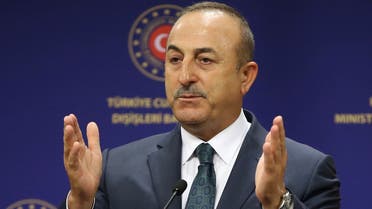 A handout image made available by the Turkish Foreign Ministry Press Office on June 19, 2020, shows the Turkish Foreign Minister Mevlut Cavusoglu speaking during a joint press conference with his Italian counterpart following their meeting in Ankara. 
