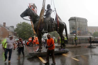 Workers remove the statue of Confederate General Stonewall Jackson from it's pedestal, July 1, 2020, in Richmond, Va. (AP)