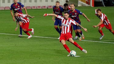 Atletico Madrid's Saul Niguez scores their second goal from the penalty spot, as play resumes behind closed doors following the outbreak of the coronavirus disease. (Reuters)