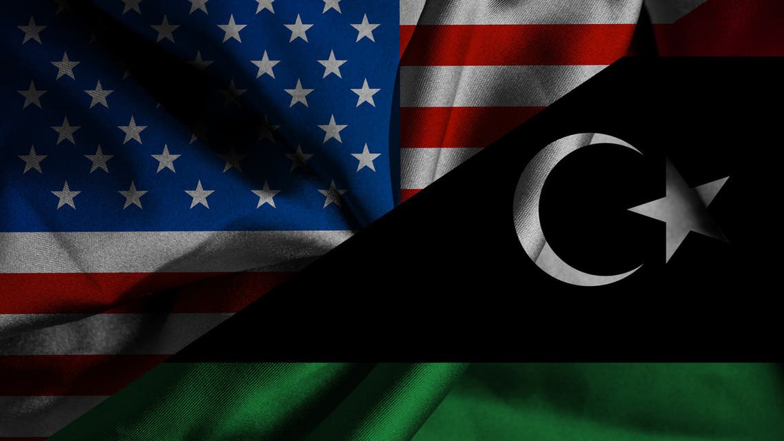 Libya and United States two flags together realations textile cloth fabric texture stock photo