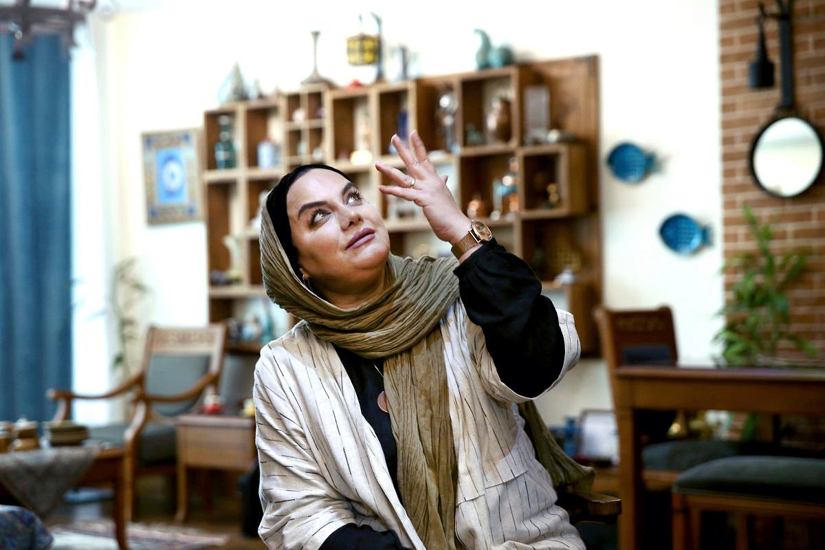 In this Saturday, Oct. 21, 2017 photo, Iranian film director Narges Abyar gestures gives an interview with The Associated Press at her home, in Tehran, Iran. (AP)