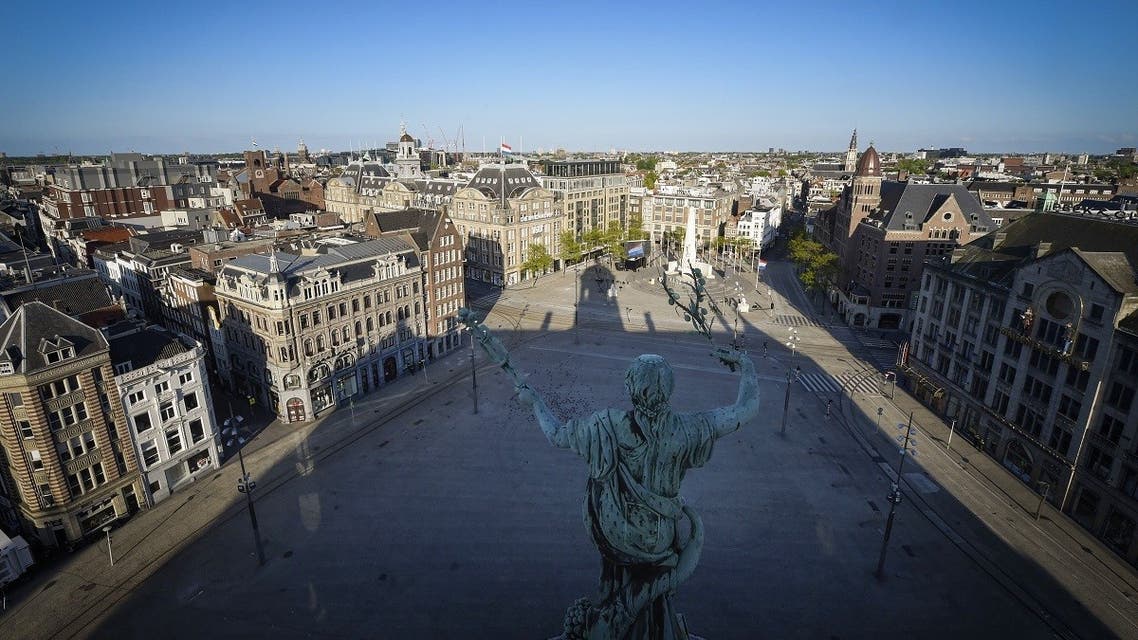A picture taken on May 4, 2020 from the Royal Palace shows a general view of Dam Square in Amsterdam during the coronavirus lockdown. (AFP)