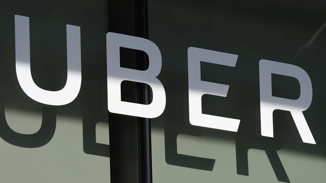 In this file photo the Uber logo is seen at the second annual Uber Elevate Summit, on May 8, 2018 at the Skirball Center in Los Angeles, California. (AFP)