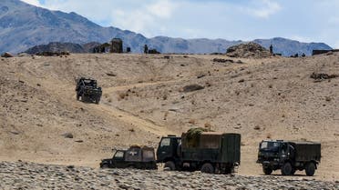  Indian army soldiers drive vehicles along mountainous roads as they take part in a military exercise at Thikse in Leh district of the union territory of Ladakh on July 4, 2020. (AFP)