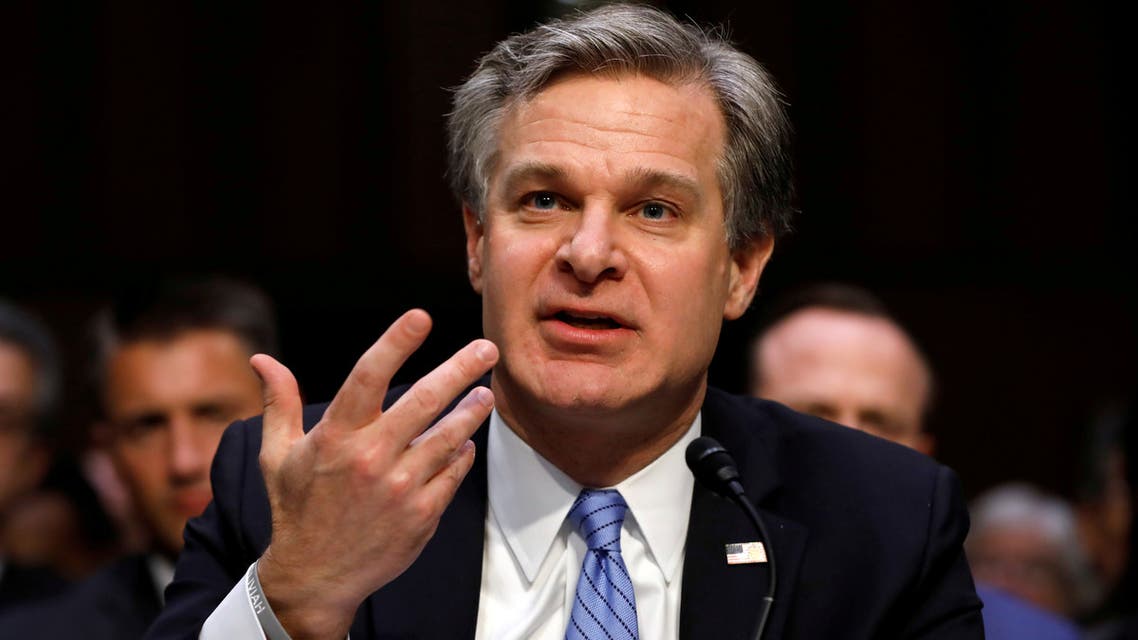 FILE PHOTO: FBI Director Christopher Wray testifies before a Senate Homeland Security and Governmental Affairs Committee hearing on threats to the homeland on Capitol Hill in Washington, U.S. November 5, 2019. REUTERS/Yuri Gripas/File Photo