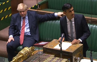A video grab from footage broadcast by the UK Parliament's Parliamentary Recording Unit (PRU) shows Britain's Prime Minister Boris Johnson (L) listening as Britain's Chancellor of the Exchequer Rishi Sunak delivering his Summer Economic Statement in the House of Commons in London on July 8, 2020. (AFP)