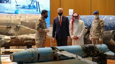 Saudi Arabia's Minister of State for Foreign Affairs Adel al-Jubeir and US Special Representative for Iran Brian Hook, check the display of the debris of ballistic missiles and weapons which were launched towards Riyadh. (File Photo: Reuters)
