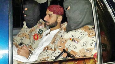 Uzair Jan Baloch with armed men. (Twitter)