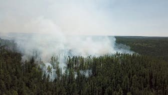 Russian firefighters seed clouds to douse raging wildfires in Siberia