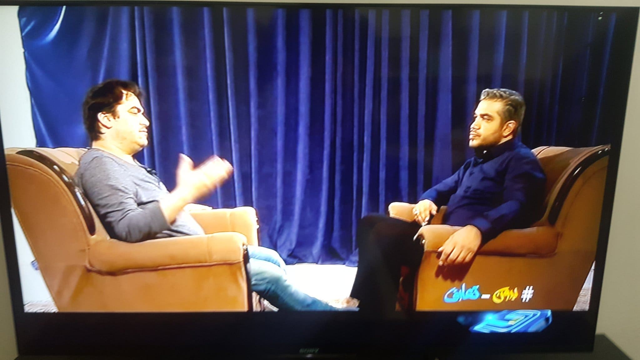 المذيع علي رضواني ( يمين) والصحافي المعتقل روح الله زم