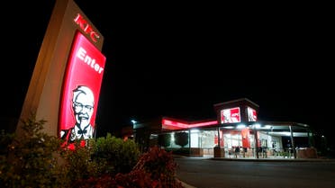 An illuminated sign stands at the entrance to a KFC outlet in the Sydney suburb of Villawood April 27, 2012. (File photo: Reuters)