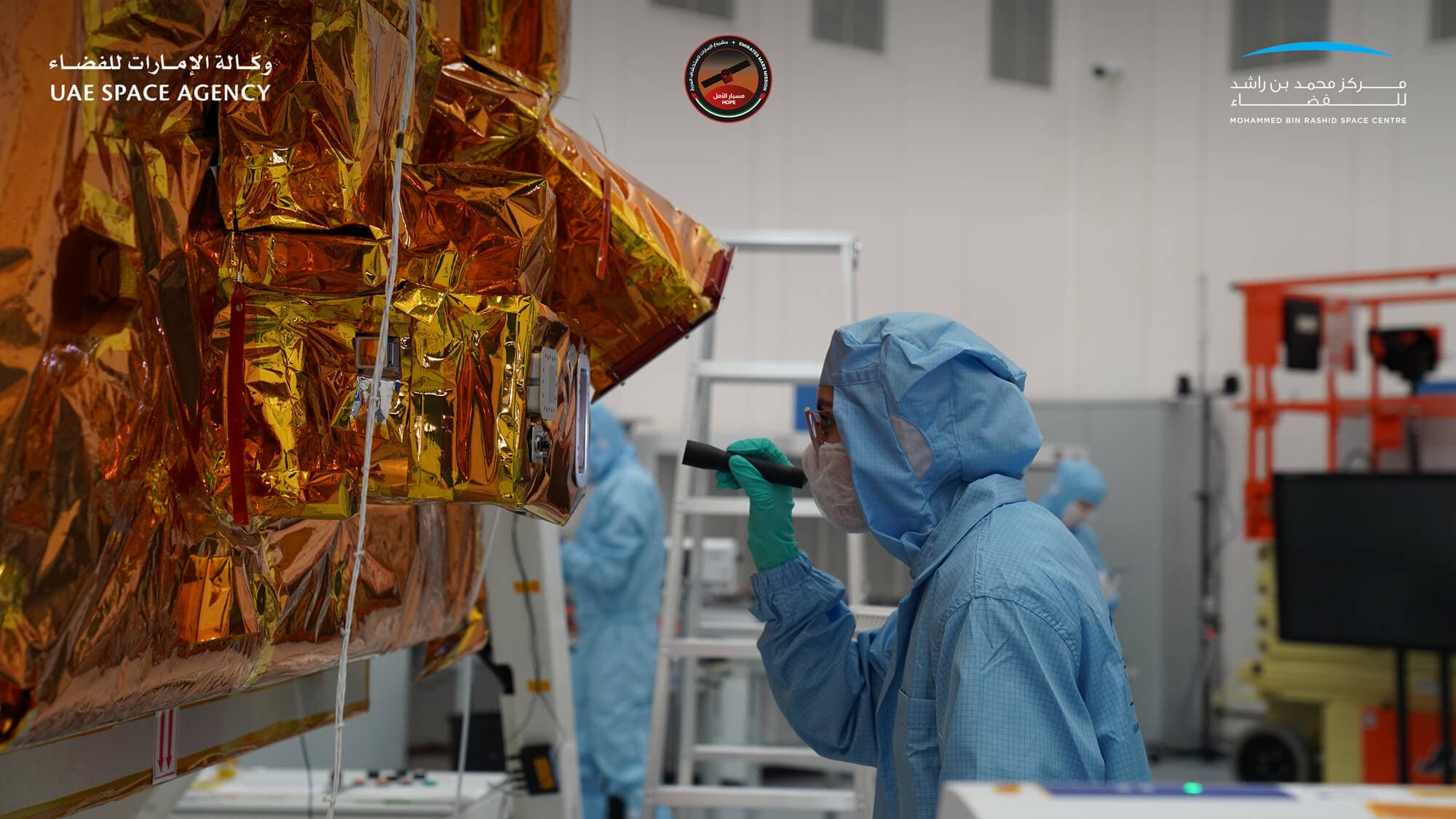 A scientist inspects the Emirates Mars Mission Hope Probe. (UAE Space Agency and Mohammed bin Rashid Space Centre)