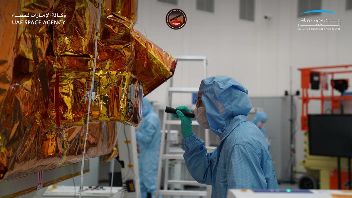 A scientist inspects the Emirates Mars Mission Hope Probe. (UAE Space Agency and Mohammed bin Rashid Space Centre)