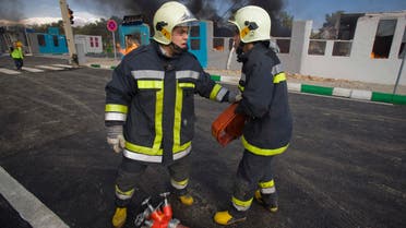 Fire fighters take part in a preparation for disaster manoeuvre in north eastern Tehran, Iran. (File photo: Reuters)