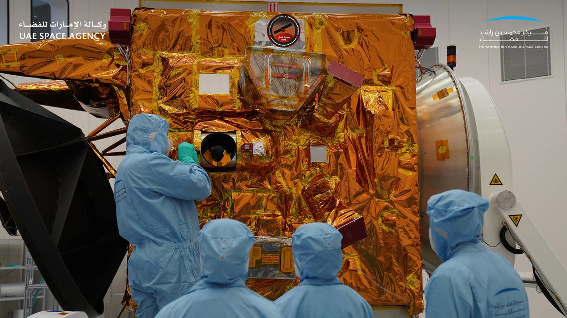 Scientists inspect the Emirates Mars Mission Hope Probe. (UAE Space Agency and Mohammed bin Rashid Space Centre)