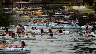 Tubers float the Comal River despite the recent spike in COVID-19 cases, Thursday, June 25, 2020, in New Braunfels, Texas. (AP)