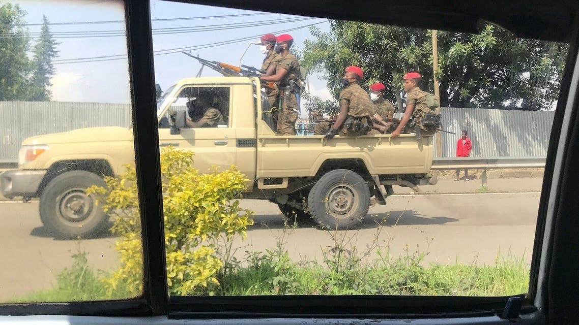 Ethiopian military ride on their pick-up truck as they patrol the streets following protests in Addis Ababa, Ethiopia July 2, 2020. (Reuters)