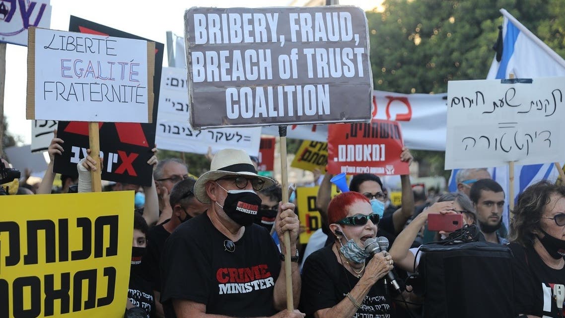 Israelis protest against Israeli Prime Minister Benjamin Netanyahu outside his official residence in Jerusalem, July 14, 2020. (AFP)