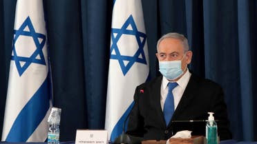 Israeli Prime Minister Netanyahu wears a protective mask, amid the spread of the coronavirus disease (COVID-19), as he holds a weekly cabinet meeting at the Foreign Ministry in Jerusalem, July 5, 2020. (Reuters)