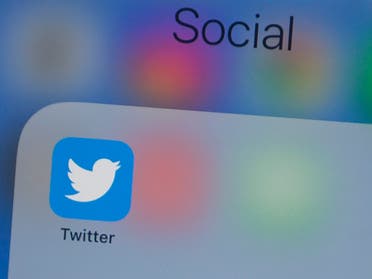 In this file photo taken on July 10, 2019, the Twitter logo is seen on a phone in this photo illustration in Washington, DC. (AFP)