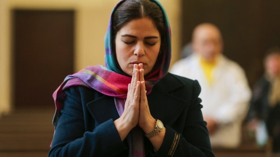 An Iranian Christian prays during mass at the Saint Sarkis Armenian Cathedral in Tehran on January 1, 2020. (File photo: AFP)