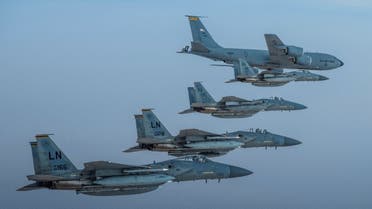 Royal Saudi Air Force F-15C Eagles fly in formation with US Air Force F-15Cs in an undisclosed location, June 2, 2019. (US Navy via Reuters)