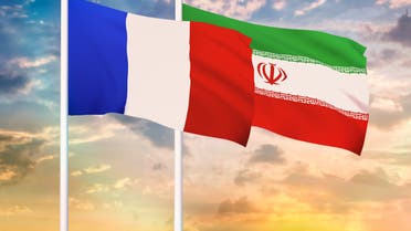 Iran and France two flags together realations textile cloth fabric texture stock photo