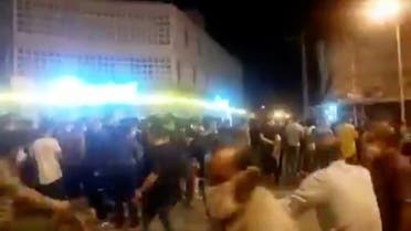 Still image from a video shows people protesting over economic hardship, on the streets of Behbahan. (Reuters)