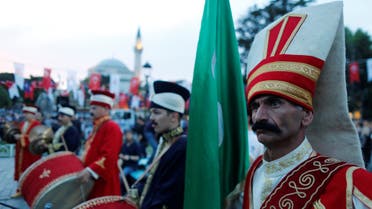 Members of traditional Ottoman band Mehter perform before breaking fast at Sultanahmet Square on the first day of the holy fasting month of Ramadan in Istanbul, Turkey May 16, 2018. (Reuters)