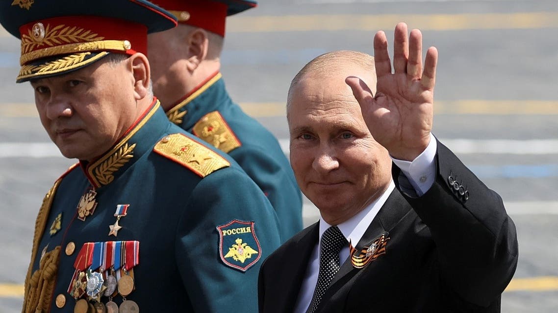 Russia's President Vladimir Putin and Defence Minister Sergei Shoigu leave after the Victory Day Parade in Red Square in Moscow, Russia, June 24, 2020. (Reuters)
